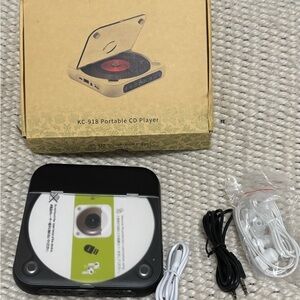 Brand new in box Portable CD Player with Accessories. Never used.